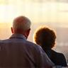 Portrait of an older couple enjoying the view from the CN Tower
